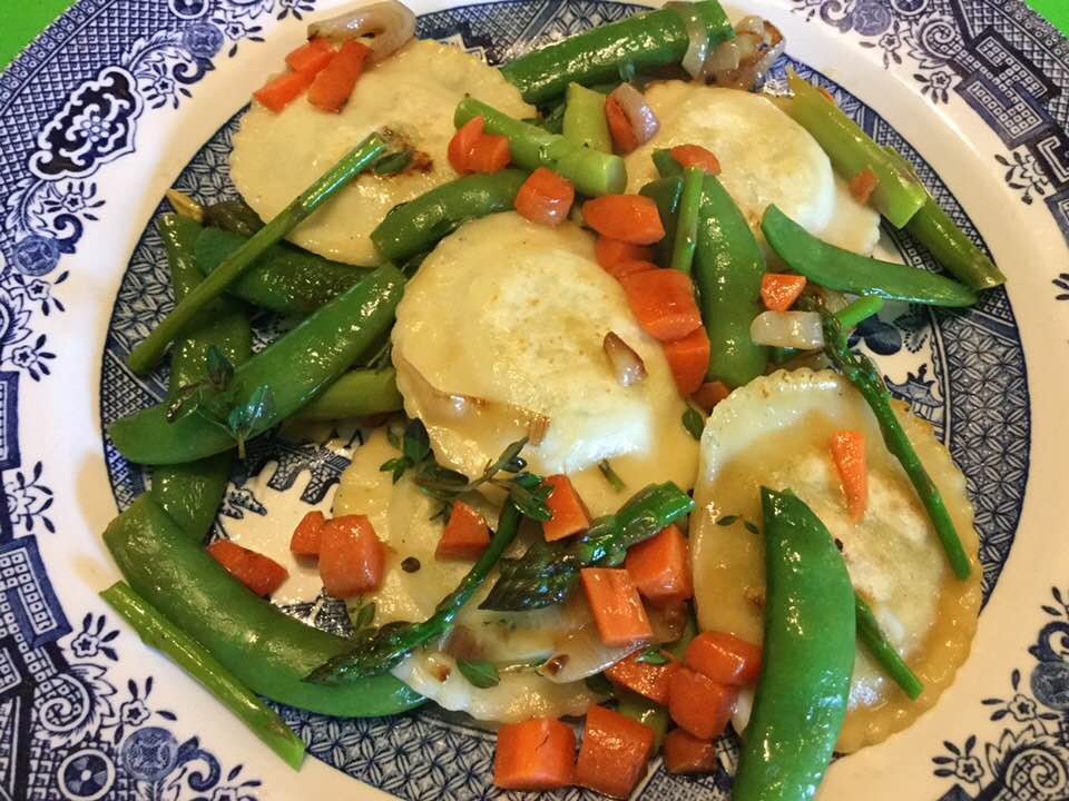 rav with spring vegges plated