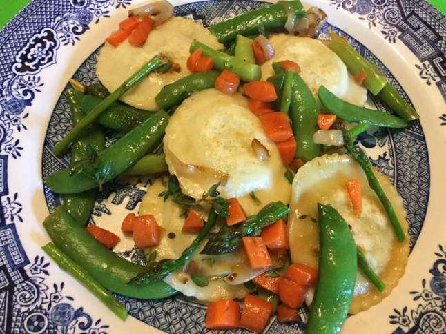 rav with spring vegges plated